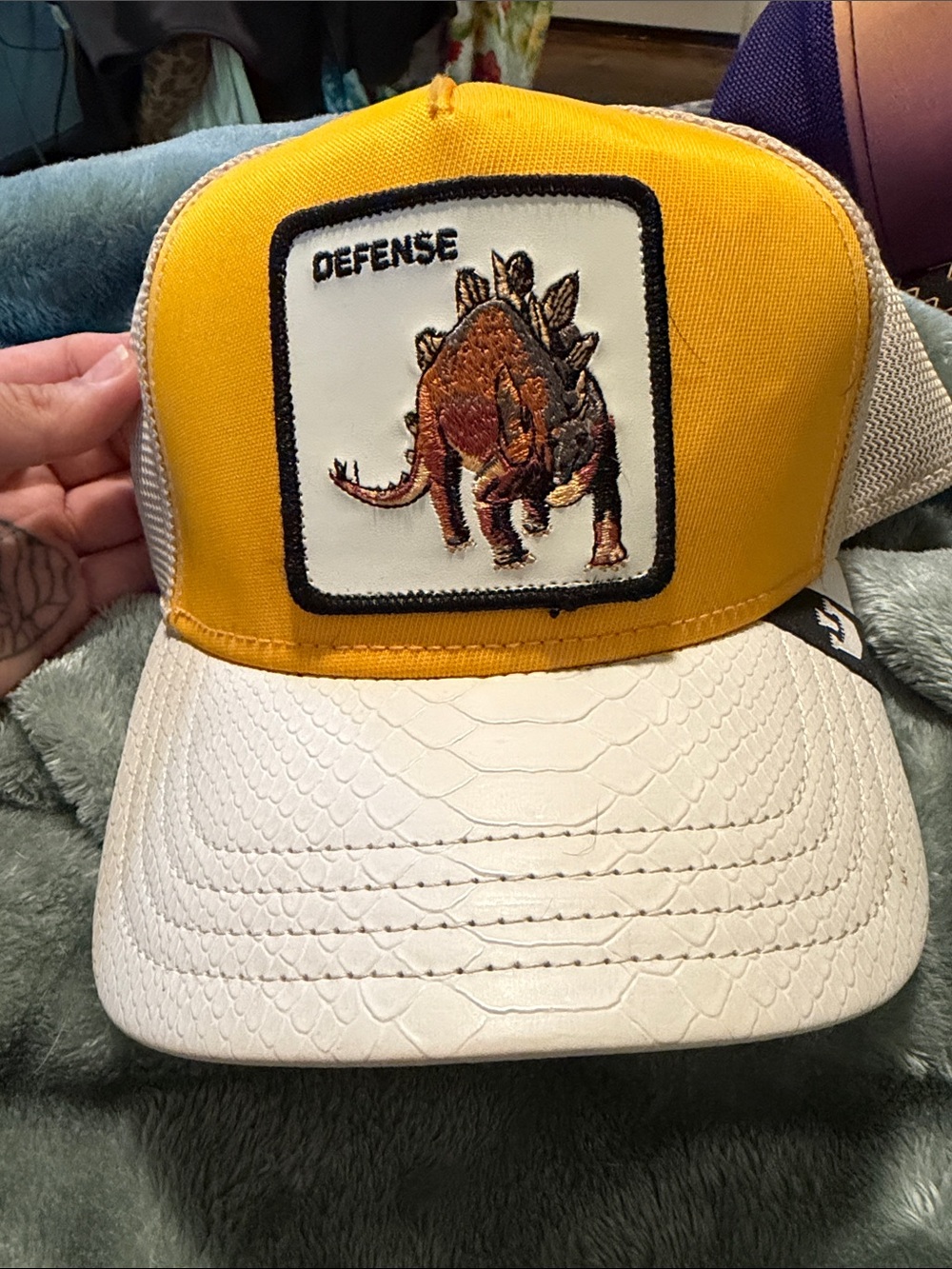 Defense Stegosaurus Patch Trucker Hat - Yellow and White Goorin bros